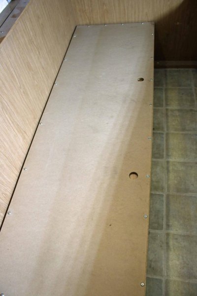 Oriented Strand Wood Under Couch.jpg