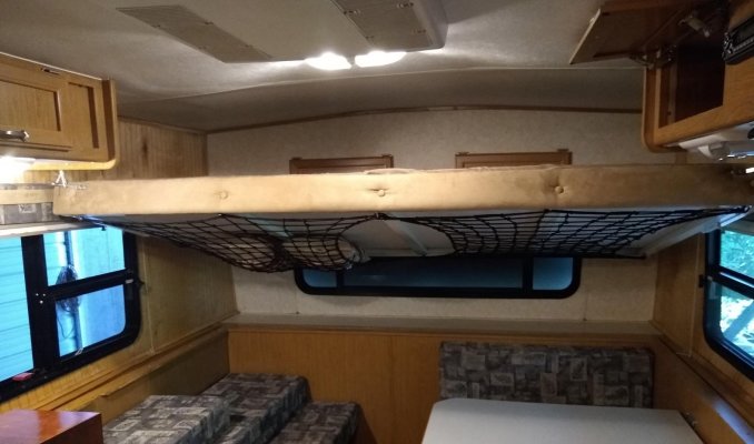 Overhead bunk in semi-lowered position.jpg