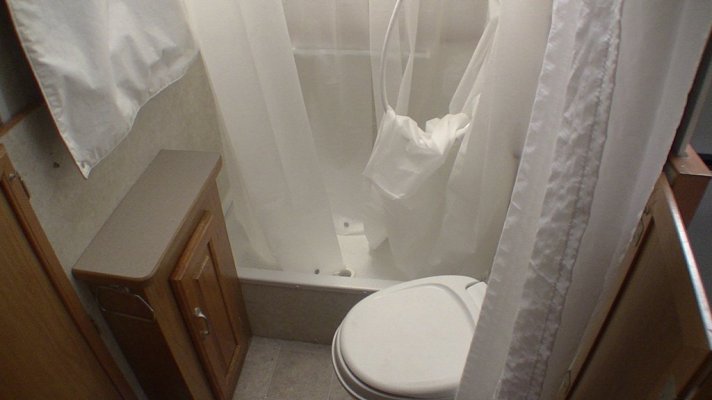 57. commode - shower open 1.JPG