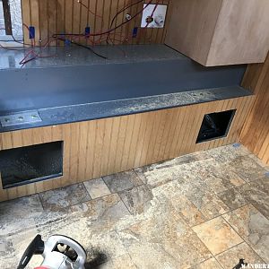 Installed bead board under counter space