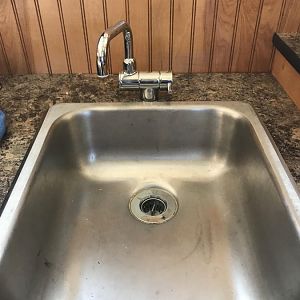 sink and cold water faucet