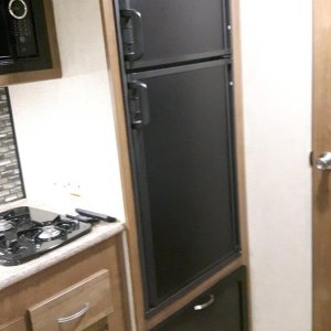 Adding a cabinet door under the fridge