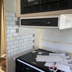 Start of the subway tile in the kitchen