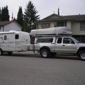 The whole setup:
Motorcycle & rack; boat loader & boat.
When I ordered the trailer, I asked Tammy if it was okay to NOT put the large Escape logo on t