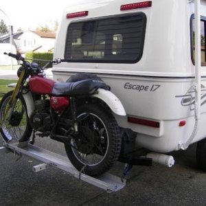 Motorcycle on motorcycle rack.