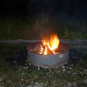 campfire near the rocky mountains