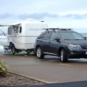 Towing trailer with a Lexus RX350 AWD w\tow package. Even though it's only a V6 I was happy with it's performance. Experienced zero sway with the trai