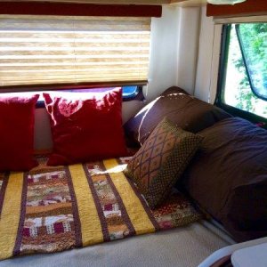 Our 17B has a full time bed with inner spring mattress, very comfortable. It’s our spot to lounge around on a rainy day to read or watch a movie.