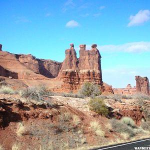 The Three Gossips in Arches