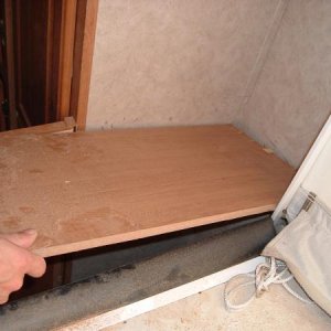 Rear Shelf 6: The other side of the shelf was easier to remove as the shower wall was no longer an obstacle (due to staples).