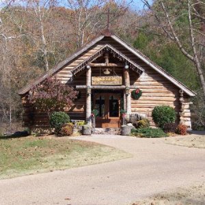 Log cabin church near the beginning just over the covered bridge.