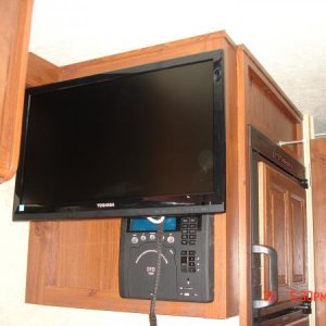 24 inch flat panel on swing arm with entertainment center