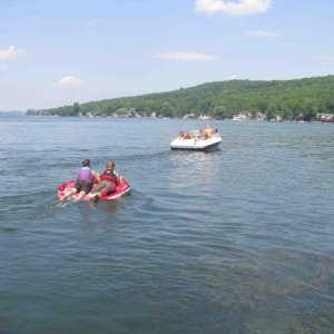 Friends and family tubing on Lake Conesus, south of Rochester N.Y.