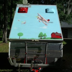 Snoopy battles the skies over WWI Europe. Dome vent is his doghouse.