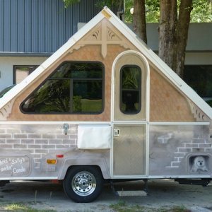 Right side of Snoopy Twoo is "gingerbread" house with simulated decorative wood that is actually just sir brushed detail.