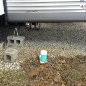 First steps, gravel under camper...
Sewer is now all hooked up and working...