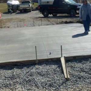 Second step, concrete pad with anchors installed