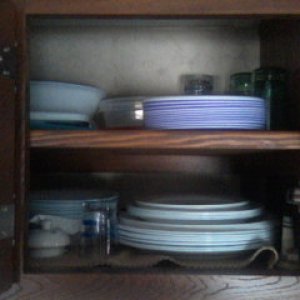 additional shelf in kitchen cupboard