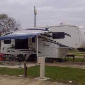 Our camper at Cypress Bend RV park in Iowa, Louisiana. A few days before the wind took the awning.