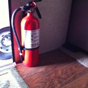 10# fire extinguisher replaced smaller one at front door