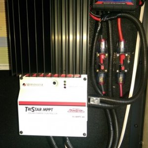 Morningstar MPPT TS-60 Charge Controller 2/30 amp breakers the one on the left feeds 200 watt Solar string and the one on the right feeds the 320 watt