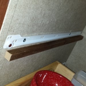 Left drawer slide. Mounted with Toggle Bolts