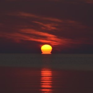 Various stages of sunrise on Lake Huron on Friday, July 10, 2015