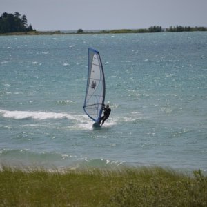 Sailboarding on Lake Michigan (this is not me on the board!)