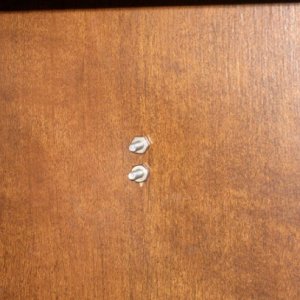 pantry interior closeup showing kitchen towel ring bolts