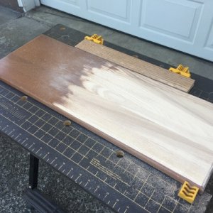 I decided to experiment on the back of the center leaf. The belt sander worked really well with getting down to bare wood. I used 220 grit sandpaper o