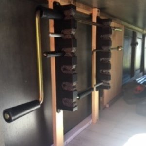 Organized manual crank handle storage