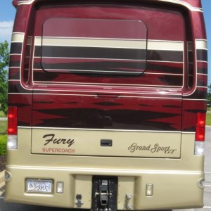 Fury. Note Fury name badge, 40,000 lb rated hitch, air line hookups (so-called Glad Hands), & 2 different electrical hookups for towed vehicles.