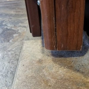 Floor Scrape bottom corner of kitchen cabinet that hits floors