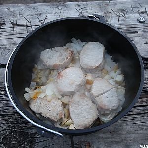 Pork chops with potatoes and apples