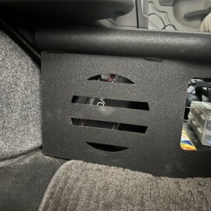 Door speaker amp in center console