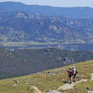 Tourists Take in the View on the Flattop Mnt Trail