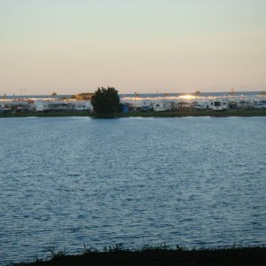 View of the ocean over the lake at Myrtle Beach Travel Park