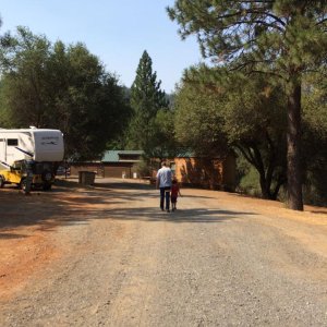 walking with daddy at Yosemite Pines RV park