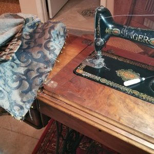 I used my grandmother's treadle to reupholster the sofa.