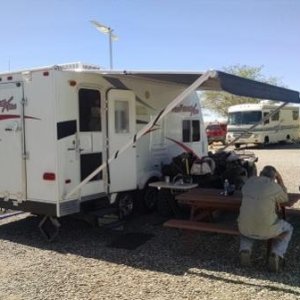 Escapees Camp Spot, My buddy Bob at Table counting nuggets from a day's hunt; Escapees Campground, Congress, AZ