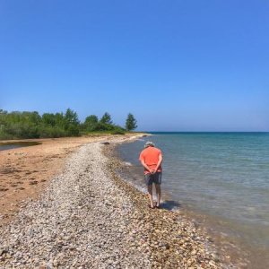 Combing the beach for fossils at Cross Village