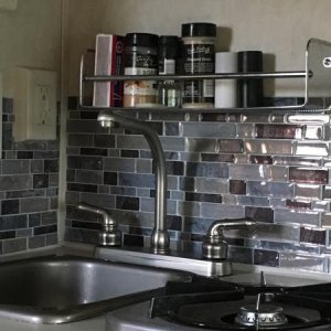 sticky "tile" backsplash and new kitchen faucet