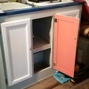 Inside cabinets...pop of coral