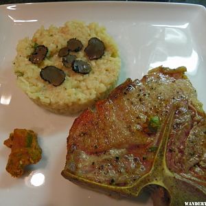 Veal T- Bone, Black truffle risotto, compound butter