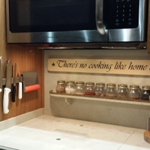 Magnetic knife rack in kitchen! Yay! I have missed this, no more cut fingers digging through utensil drawer! Thank you Todd! He used small metal hollo