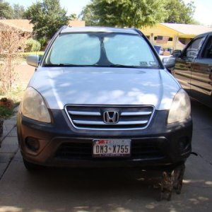 Old nasty looking headlights on 2005 Honda CRV.