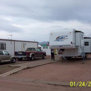 Visiting my parents in Apache Junction in 2004. That's my wife's PT Cruiser and dad's 1991 Dodge Ram D350 and Cougar 5th wheel. FYI they still have th