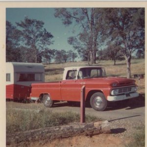 Dad's old Chevy with the camper hooked up. I think it was a Shasta. There was 6 of us loaded up in the pickup. And yes some in the bed. I slept in a h