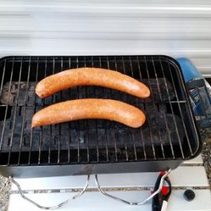 Brats on the grill.