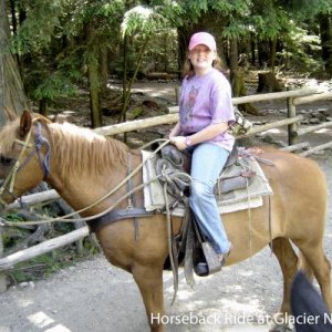 Erica on horseback at Glacier NP.